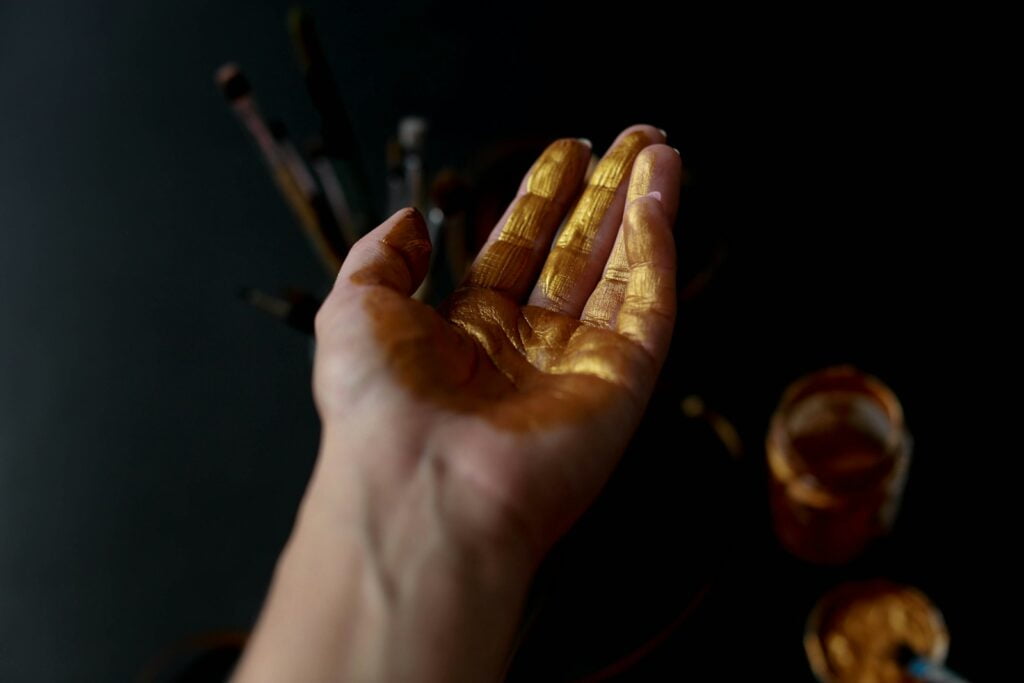 person's left palm-historical value of gold
